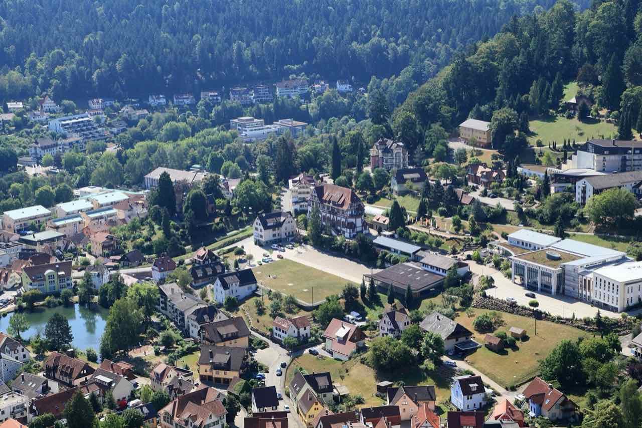View from Burg Liebenzell over the town lake and the hillside with the Liebenzell Mission campus buildings