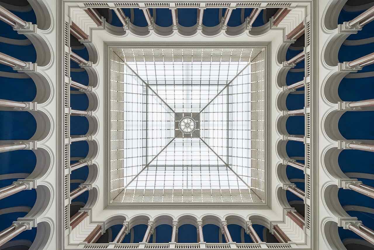 The light court with a wide staircase inside the main building of the Technische Universität Berlin
