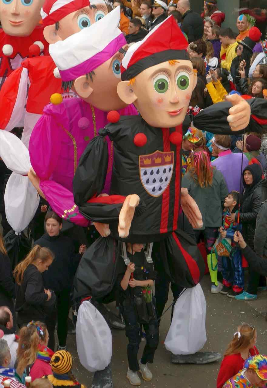 Large papier-mâché figures on floats in the Cologne Rosenmontag parade in 2023