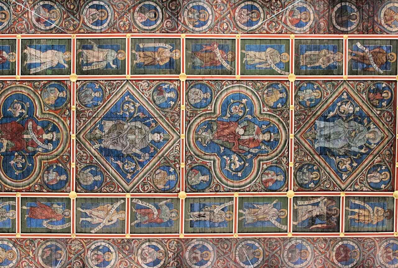 The painted wooden ceiling in the nave of St. Michael's, with rows of coloured panels