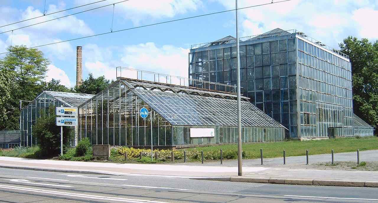 The glass and steel greenhouses of the Gruson botanical garden seen from outside