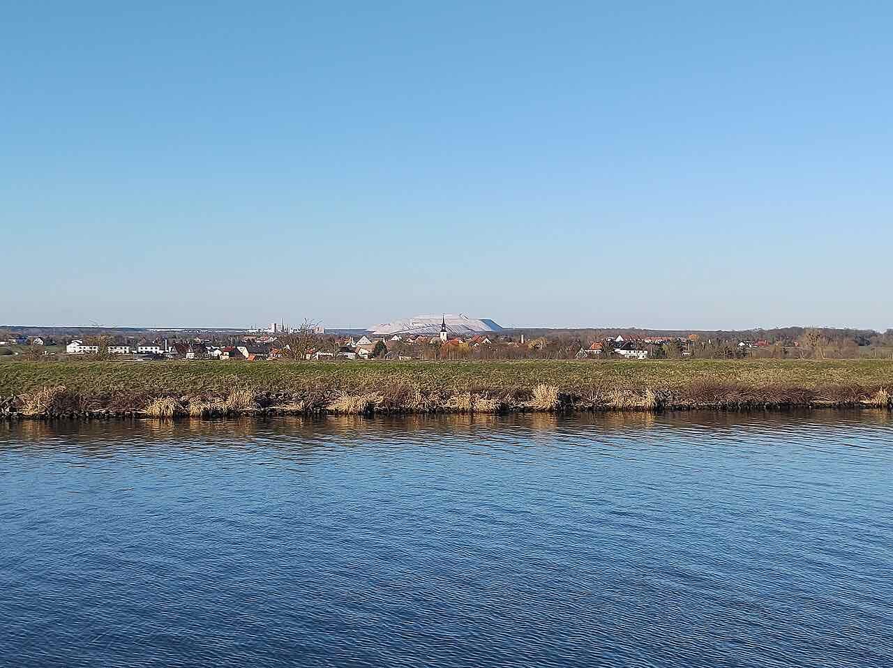 The long canal bridge of the Magdeburg Water Bridge crossing flat green land