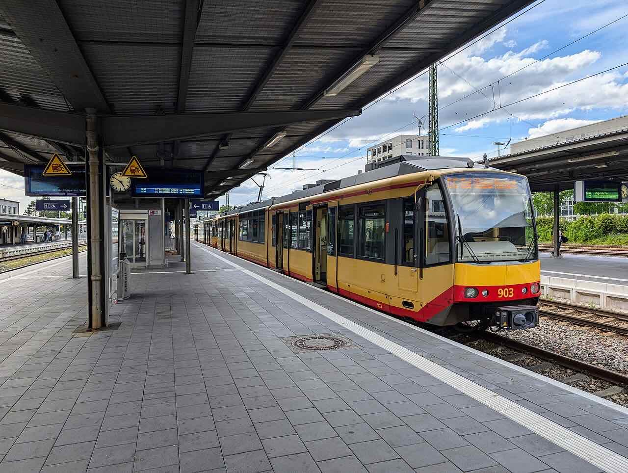 A Stadtbahn tram-train marked S6 to Bad Wildbad waiting at a platform of Pforzheim Hauptbahnhof
