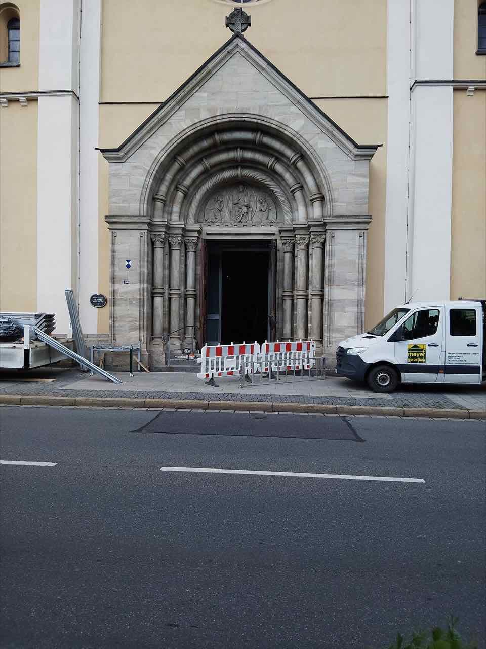 The twin towers of the St. Josef church in Weiden rising above its entrance