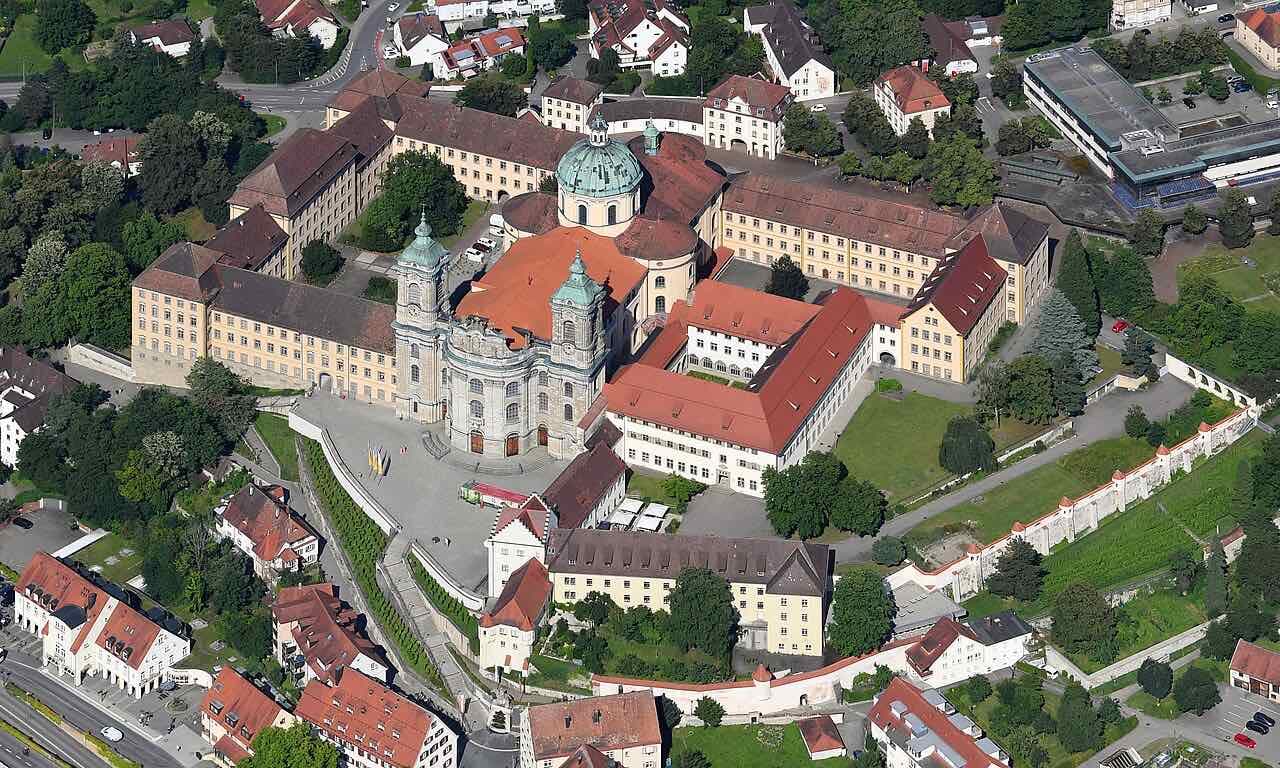 Weingarten Abbey and its basilica seen from the air, with the town and the hills of Upper Swabia around it