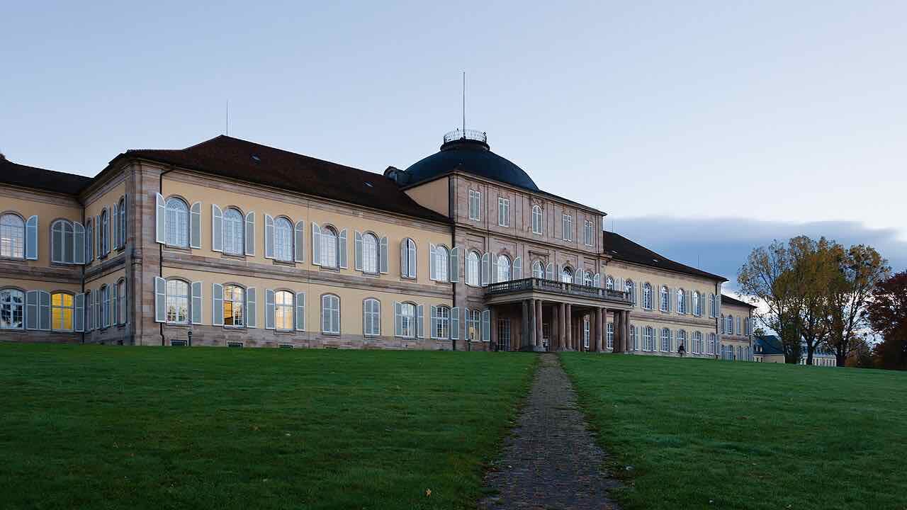 Hohenheim palace at first light, seen from the front lawn