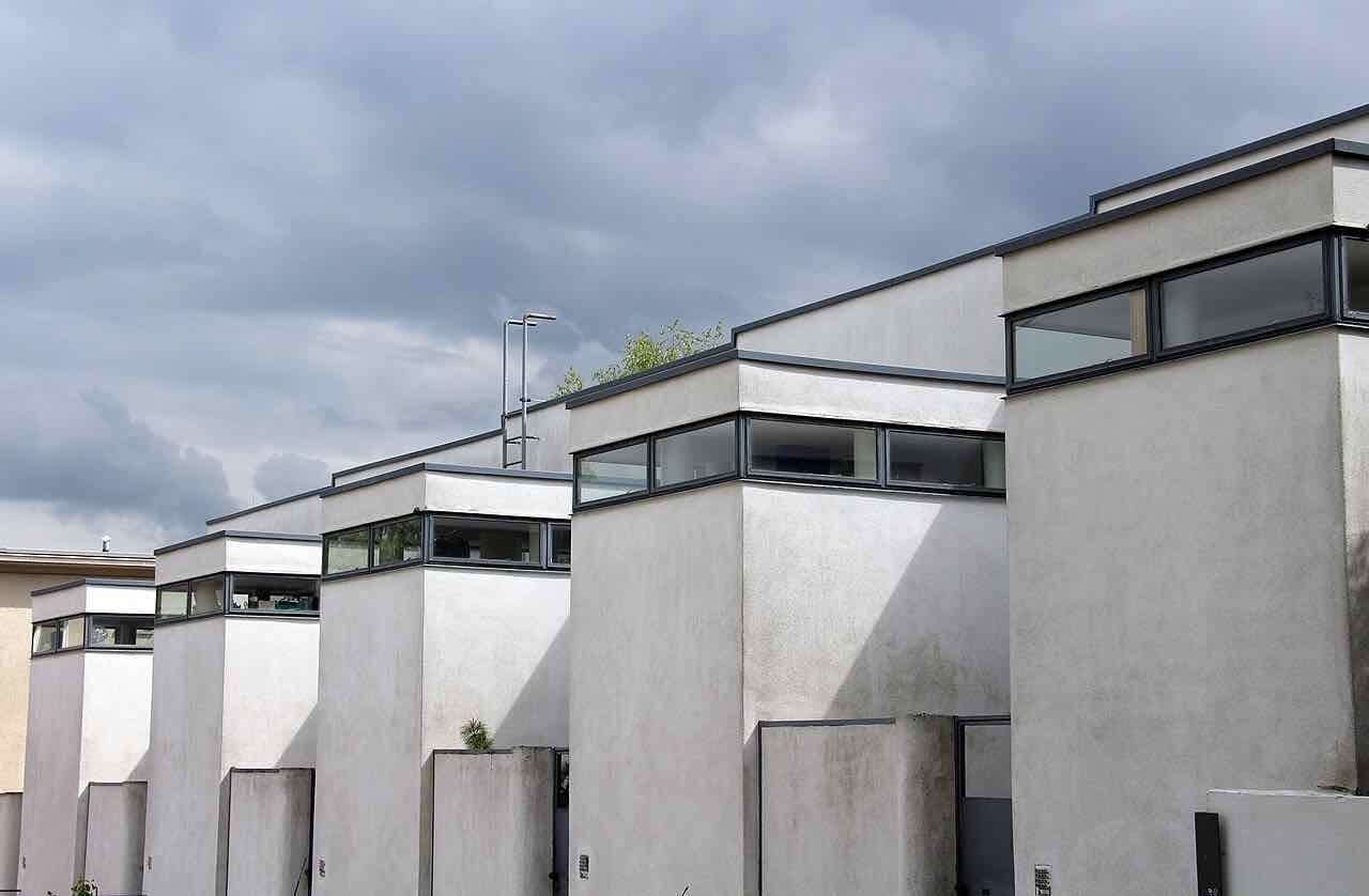 A white flat-roofed house of the Weissenhof Estate on a Stuttgart hillside