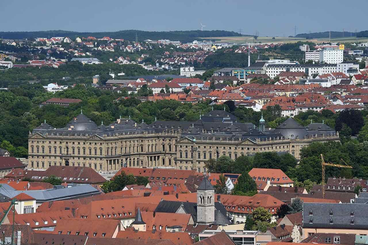 View from the Marienberg fortress gardens over the red roofs of Würzburg to the Residence